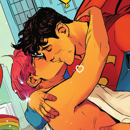 a panel from dc pride 2022 of jon and jay kissing